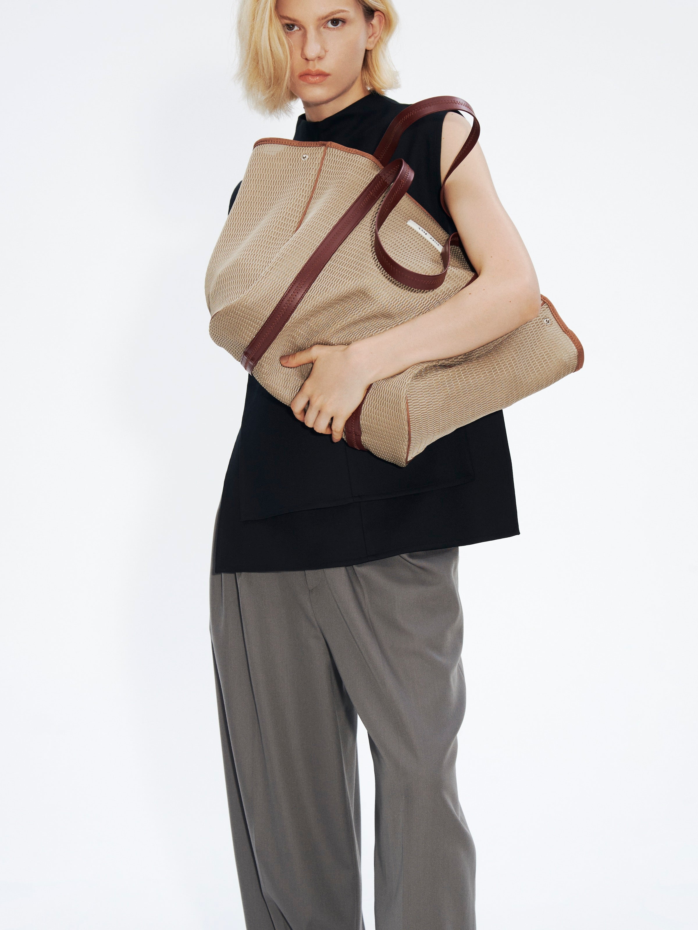 nest zip L
